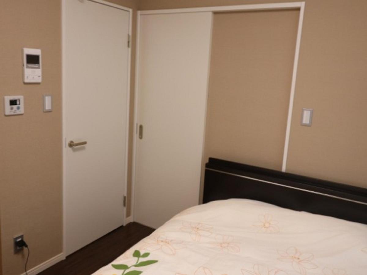 Aparthotel Mr. Kinjo In Makishi Naha Habitación foto