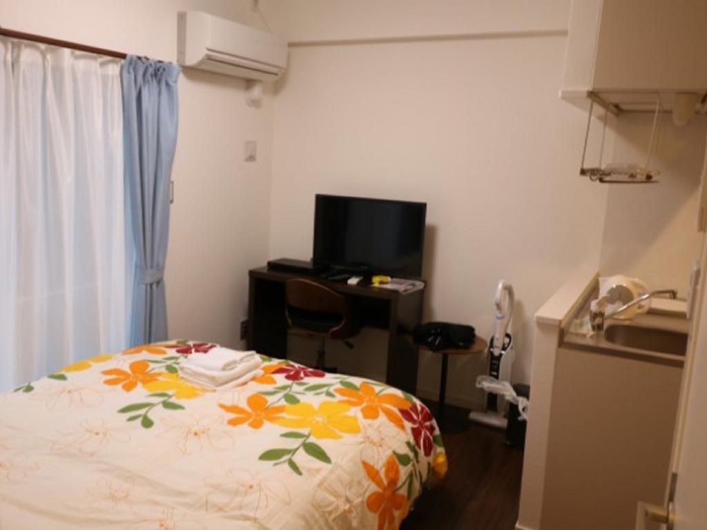 Aparthotel Mr. Kinjo In Makishi Naha Habitación foto